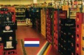 granica holendersko-belgijska przebiegajaca przez sklep
