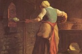 Kobieta przy pieczeniu chleba